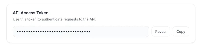 The API Access Token card in account settings, with the token masked and Reveal and Copy buttons